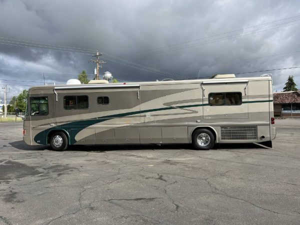 62b4a21be3a94f119e6d2f38 2002 Country Coach Class A RV INTRIGUE 40 SUITE OF DREAMS