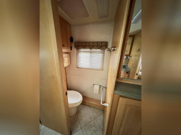 62b4a22a5caf3f2feb0bd66c 2002 Country Coach Class A RV INTRIGUE 40 SUITE OF DREAMS